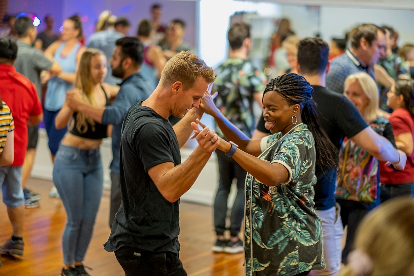 Two students laughing together while dancing at Dance Culture